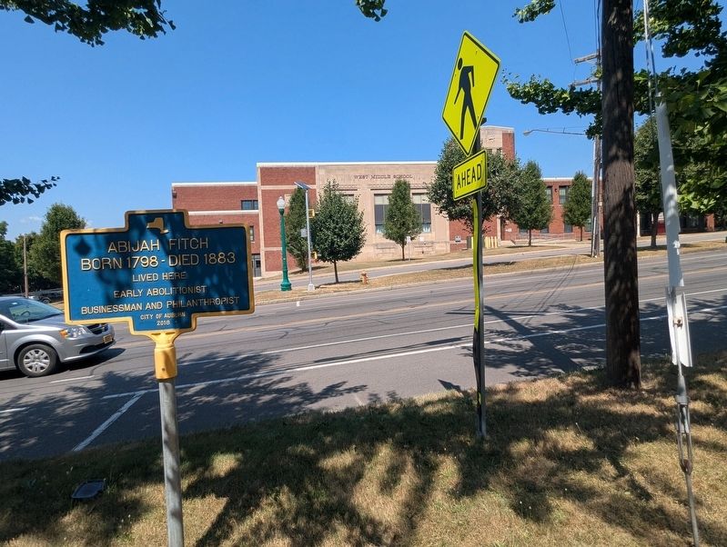 Abijah Fitch Marker is directly across the street from the West Middle School along Genesee Street image. Click for full size.