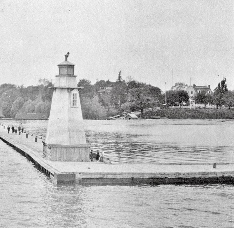 The Old Lighthouse, ca 1900, in its original location on the East Pier. Click for full size. The Old Lighthouse, ca 1900, in its original location on the East Pier image. Click for full size.