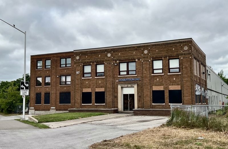 The original Robertson Manufacturing plant, in 2025 image. Click for full size.