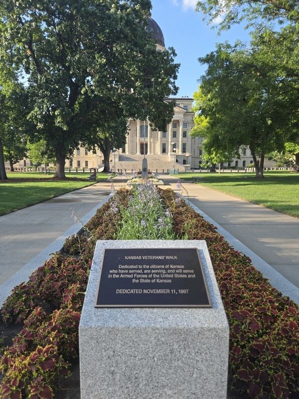 Kansas Veterans' Walk Marker looking towards the Kansas State Capitol. Click for full size. Kansas Veterans' Walk Marker looking towards the Kansas State Capitol image. Click for full size.