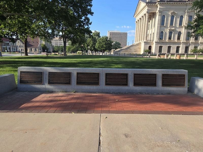North wall of the Ad Astra Plaza. The Impact of the European Fur Trade Marker is 3rd from the left image. Click for full size.