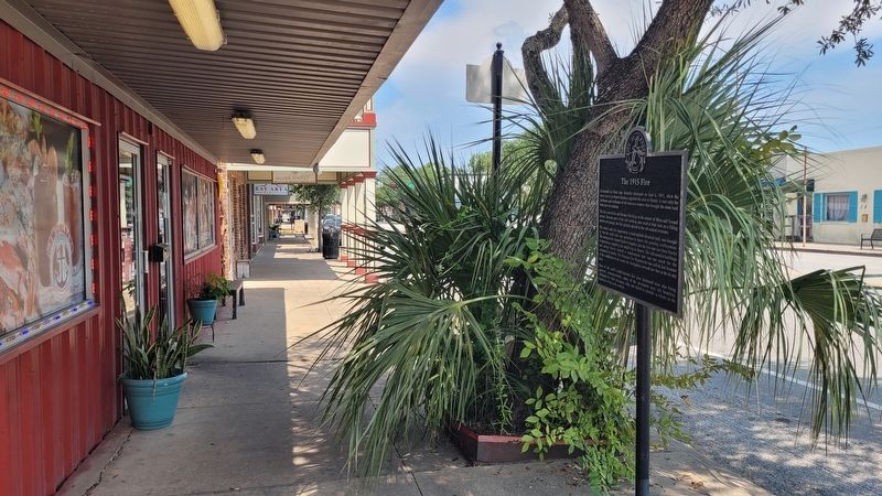 The view of the 1915 Fire Marker along the sidewalk. Click for full size. The view of the 1915 Fire Marker along the sidewalk image. Click for full size.