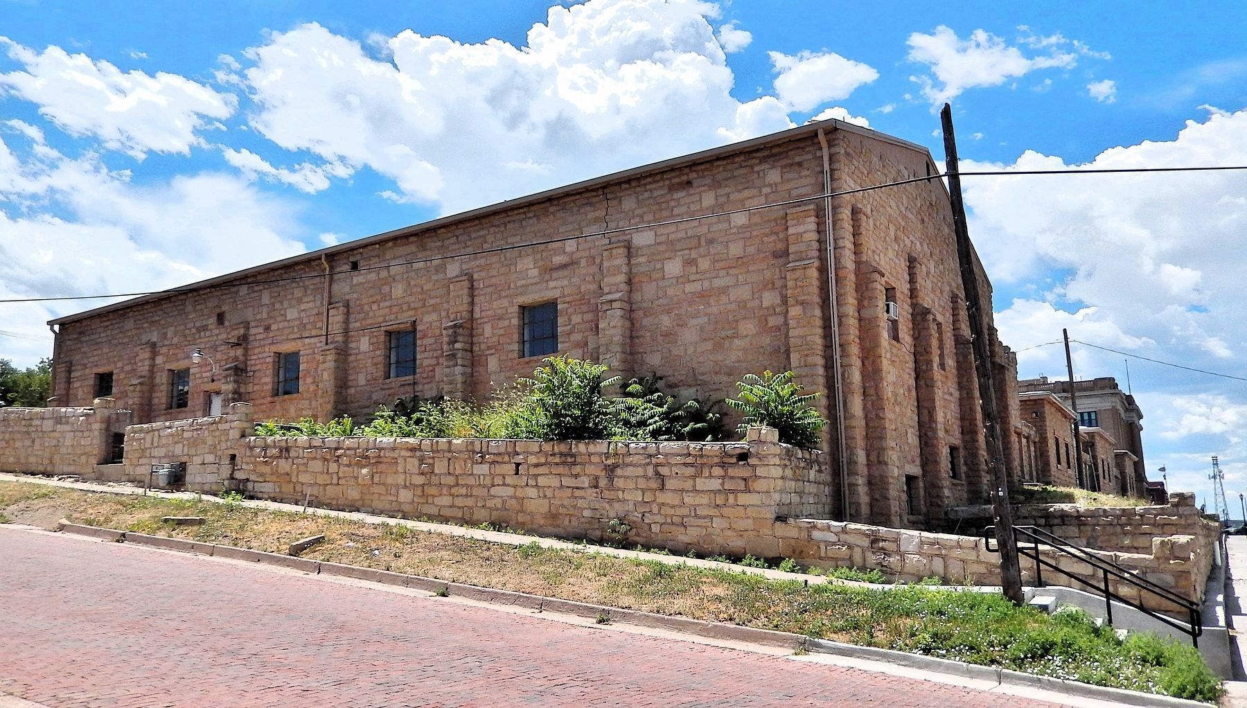 Fort Wootton Veterans' Memorial Square (<i>northeast elevation</i>) — Holloway Auditorium. Click for full size. Fort Wootton Veterans' Memorial Square (<i>northeast elevation</i>) — Holloway Auditorium image. Click for full size.