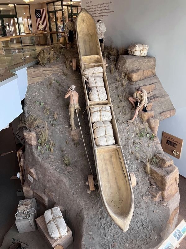 Life=size portaging diorama at the Lewis & Clark Interpredtive Center at Great Falls, Montana image. Click for full size.