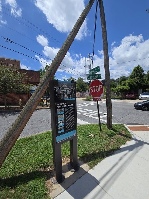 Wide view of William R. "Seaborn" Saxon Marker at Bartlett & Depot Streets. Click for full size. Wide view of William R. "Seaborn" Saxon Marker at Bartlett & Depot Streets image. Click for full size.