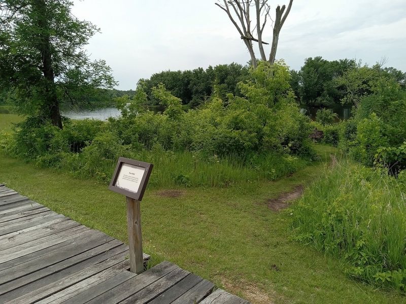 Town Well Marker on the boardwalk through the Old Crow Wing townsite. Click for full size. Town Well Marker on the boardwalk through the Old Crow Wing townsite image. Click for full size.