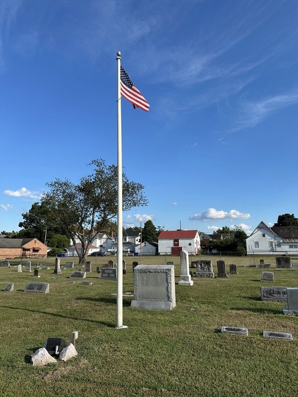 Veterans Memorial - wide view with flagpole. Click for full size. Veterans Memorial - wide view with flagpole image. Click for full size.