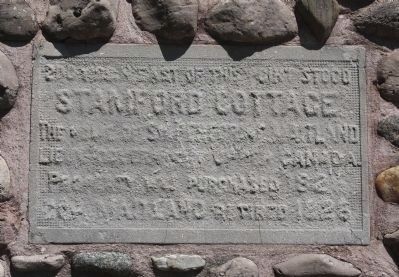 Stamford Cottage [on south side of stone cairn] image. Click for full size.