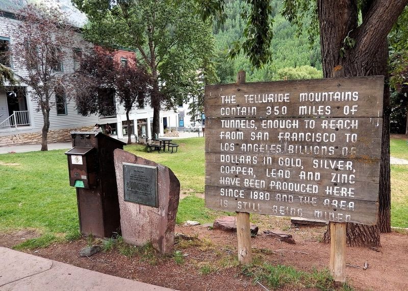 Telluride Marker & adjacent signboard image. Click for full size.