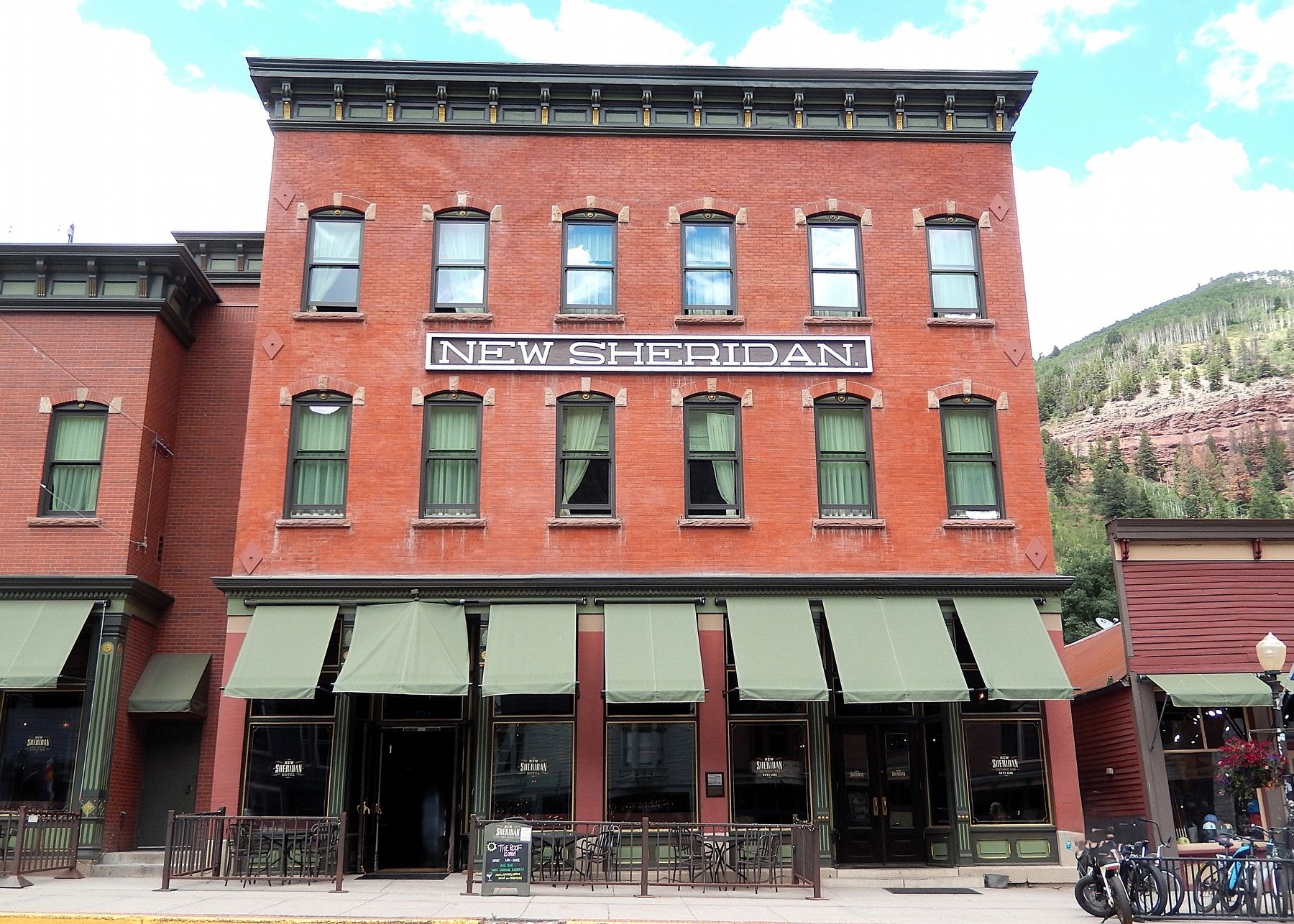New Sheridan Hotel (<i>front/south elevation</i>). Click for full size. New Sheridan Hotel (<i>front/south elevation</i>) image. Click for full size.