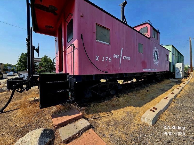 Side view of caboose train car behind James J Hill - "The Empire Builder" Marker. Click for full size. Side view of caboose train car behind James J Hill - "The Empire Builder" Marker image. Click for full size.