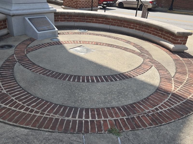 Interlocking wedding rings made of brick next to the Abraham Lincoln statue. Click for full size. Interlocking wedding rings made of brick next to the Abraham Lincoln statue image. Click for full size.