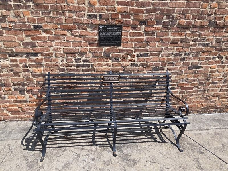 Louis Sansbury bench in honor of Louis Sandbury below marker. Click for full size. Louis Sansbury bench in honor of Louis Sandbury below marker image. Click for full size.