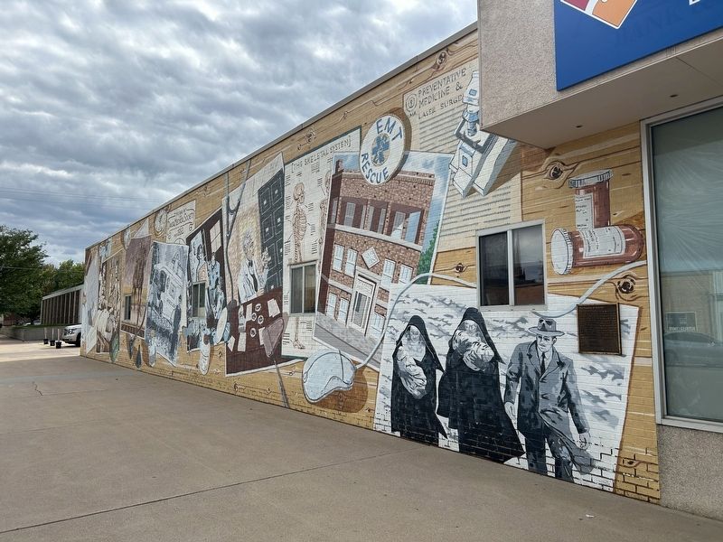 "The Evolution of Medicine" Mural & Marker. Click for full size. "The Evolution of Medicine" Mural & Marker image. Click for full size.