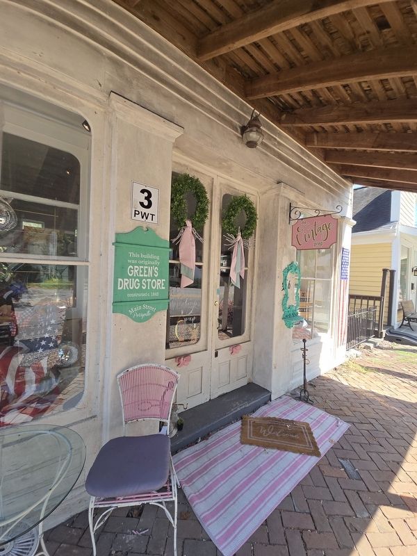 Green's Drug Store Marker near entrance of The Vintage Prep shop. Click for full size. Green's Drug Store Marker near entrance of The Vintage Prep shop image. Click for full size.