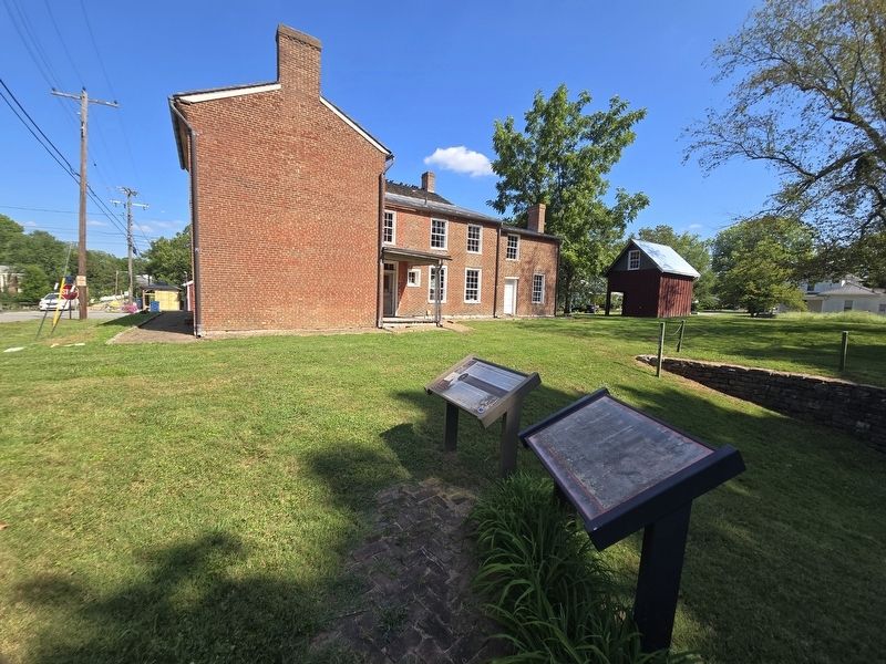 Sad and Weary Marker on the left next to another marker, rear side of the Karrick-Parks House image. Click for full size.