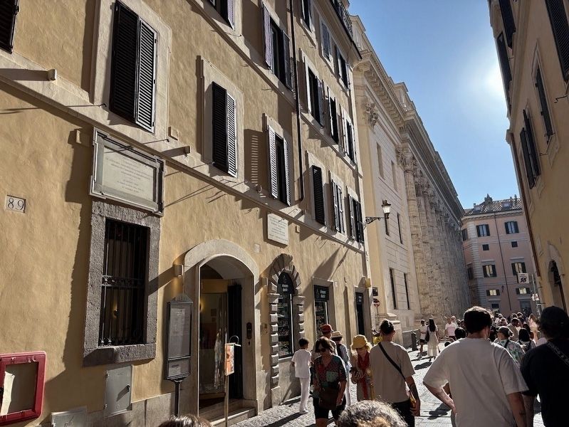 Two markers near the entrance of Hotel Cesari image. Click for full size.