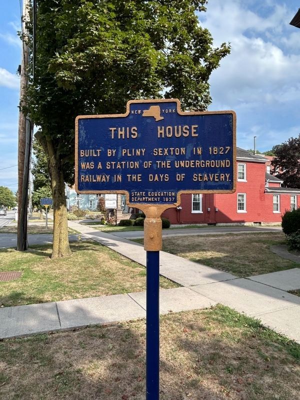 This House Marker With Dr. Harriet Adams Marker In The Background. Click for full size. This House Marker With Dr. Harriet Adams Marker In The Background image. Click for full size.