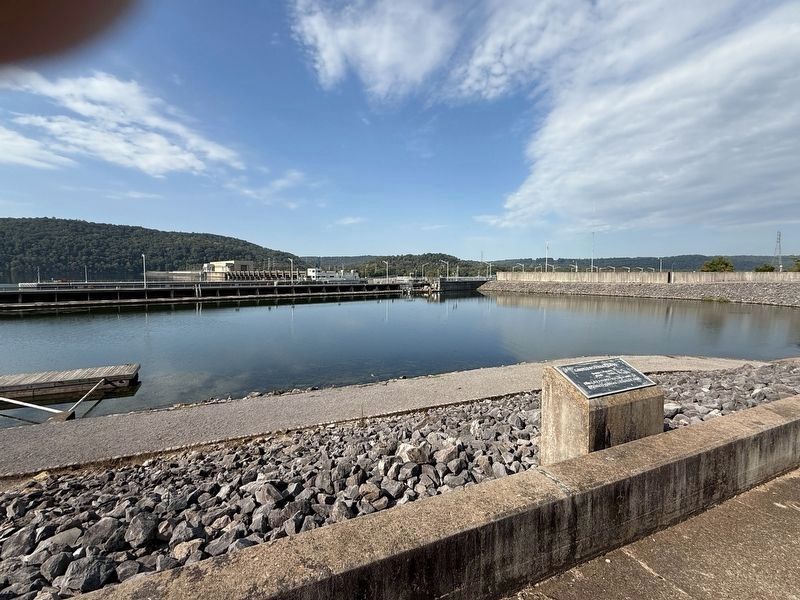 Guntersville Dam Marker with Guntersville Lock in the background. Click for full size. Guntersville Dam Marker with Guntersville Lock in the background image. Click for full size.