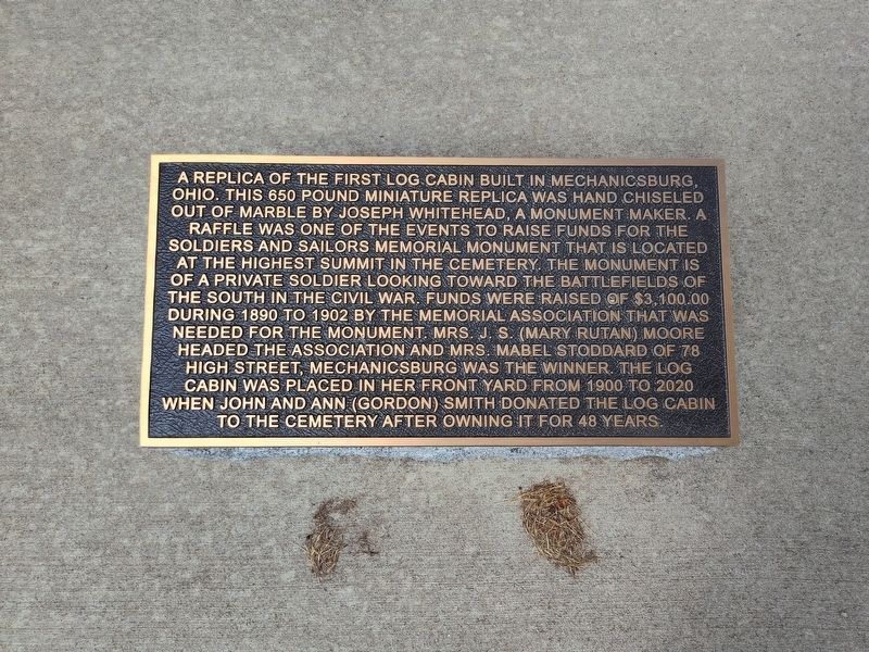 Replica of the First Log Cabin Marker. Click for full size. Replica of the First Log Cabin Marker image. Click for full size.