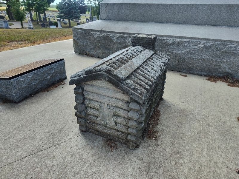 Replica of the First Log Cabin Marker. Click for full size. Replica of the First Log Cabin Marker image. Click for full size.