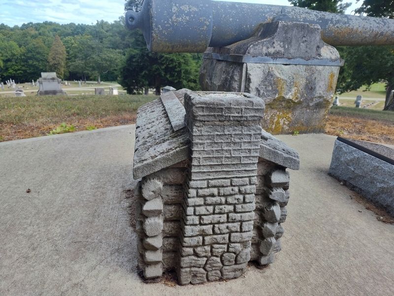 Replica of the First Log Cabin Marker. Click for full size. Replica of the First Log Cabin Marker image. Click for full size.