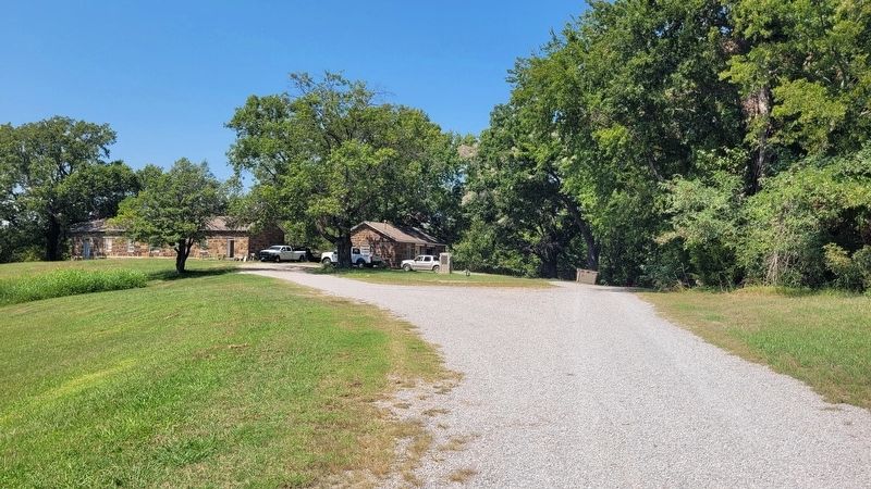 The view of the Montfort Stokes Marker down a park service road. Click for full size. The view of the Montfort Stokes Marker down a park service road image. Click for full size.