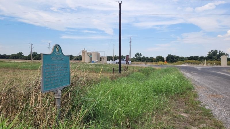 The view of the Sheridan Marker along the street. Click for full size. The view of the Sheridan Marker along the street image. Click for full size.