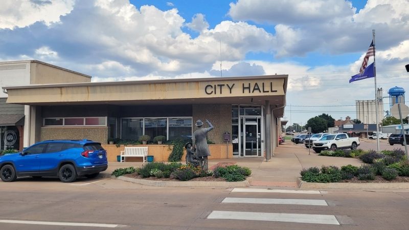 The view of the marker and statue from across the street. Click for full size. The view of the marker and statue from across the street image. Click for full size.