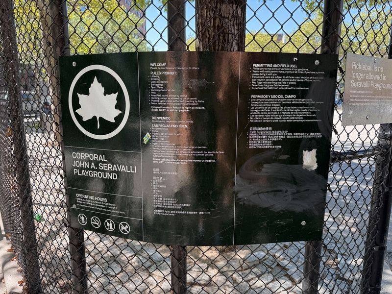 NYC Parks signage for Corporal John A. Seravalli Playground image. Click for full size.