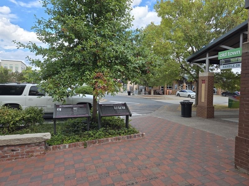Father Edward Wahl / Rev. James Spratt White Marker in front of the shopping center parking lot. image. Click for full size.