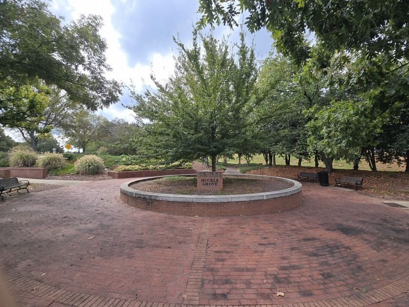 Huckle Grove Park entrance. Yoshino Cherry Marker is behind & right of the center planter. Click for full size. Huckle Grove Park entrance. Yoshino Cherry Marker is behind & right of the center planter image. Click for full size.