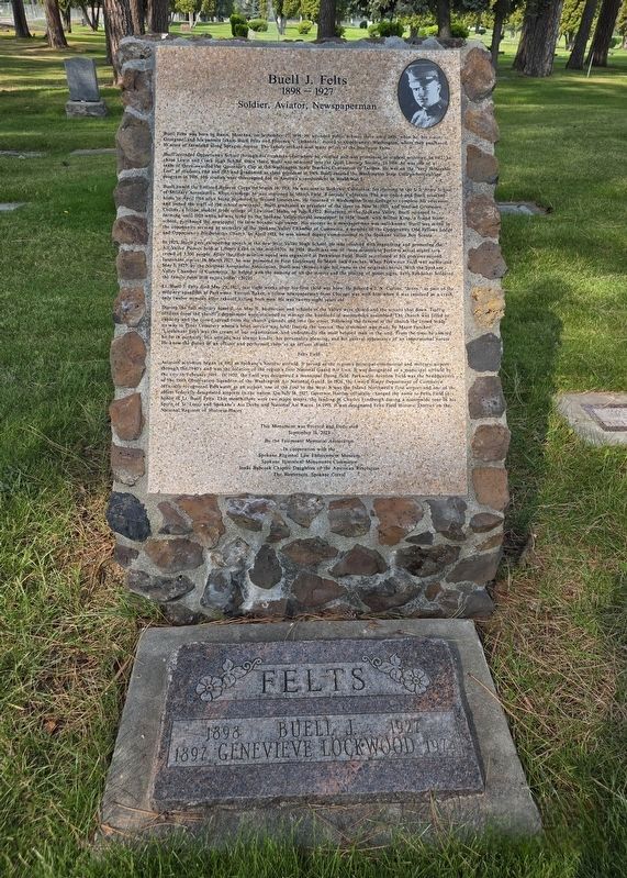 The Buell J. Felts Marker is behind the husband and wife gravestone.. Click for full size. The Buell J. Felts Marker is behind the husband and wife gravestone. image. Click for full size.