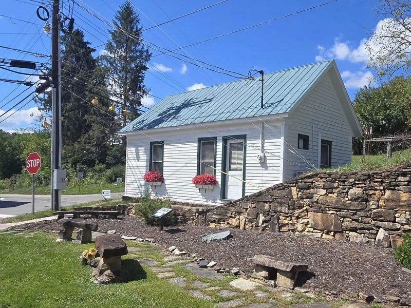 Mitchell County Historical Events Marker next to the Historical Society building image. Click for full size.