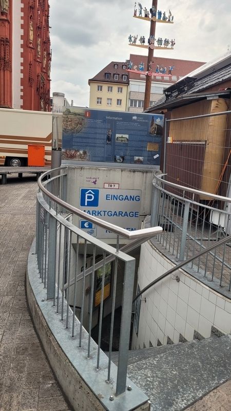 The marker is located at the entrance to an underground parking garage image. Click for full size.