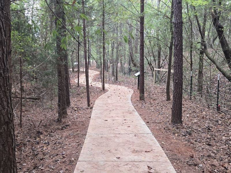 A Loyalist Base Marker on the right along the paved walkway. Click for full size. A Loyalist Base Marker on the right along the paved walkway image. Click for full size.