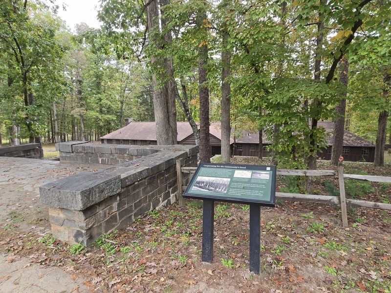 Cooperating for the Community's Good Marker overlooking the bathhouse image. Click for full size.