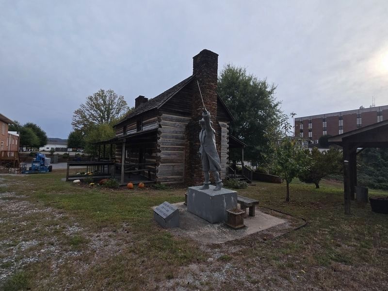 Colonel Ben Cleveland Marker and statue and its new location by the Robert Cleveland Log Home. Click for full size. Colonel Ben Cleveland Marker and statue and its new location by the Robert Cleveland Log Home image. Click for full size.