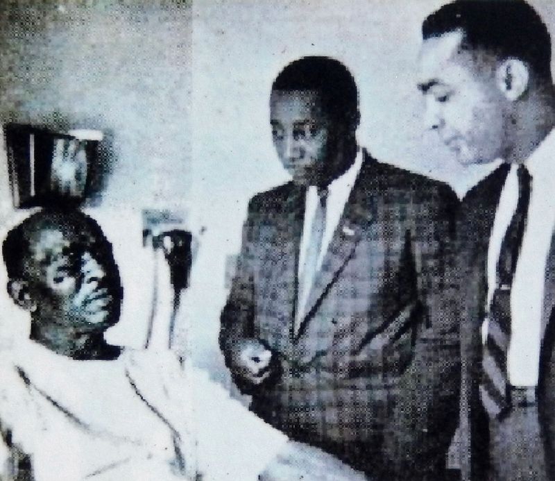 Marker detail: Charles Evers and Paul Jones visit George Metcalfe in the hospital after the bombing. image. Click for full size.