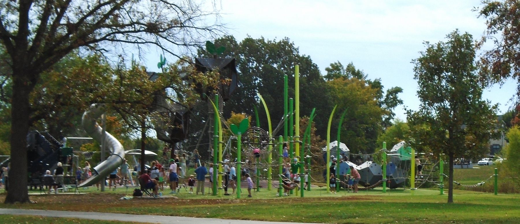 Families Enjoying the Playscape on a Beautiful Autumn Day. Click for full size. Families Enjoying the Playscape on a Beautiful Autumn Day image. Click for full size.