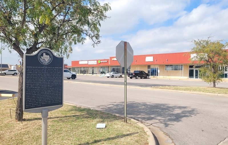 The view of the marker along the street. Click for full size. The view of the marker along the street image. Click for full size.