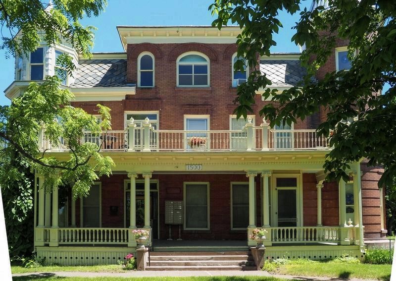 Kline Sanitarium with marker on porch, at far left image. Click for full size.