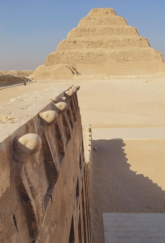 The Cobra Wall from the tomb and the Step Pyramid. Click for full size. The Cobra Wall from the tomb and the Step Pyramid image. Click for full size.