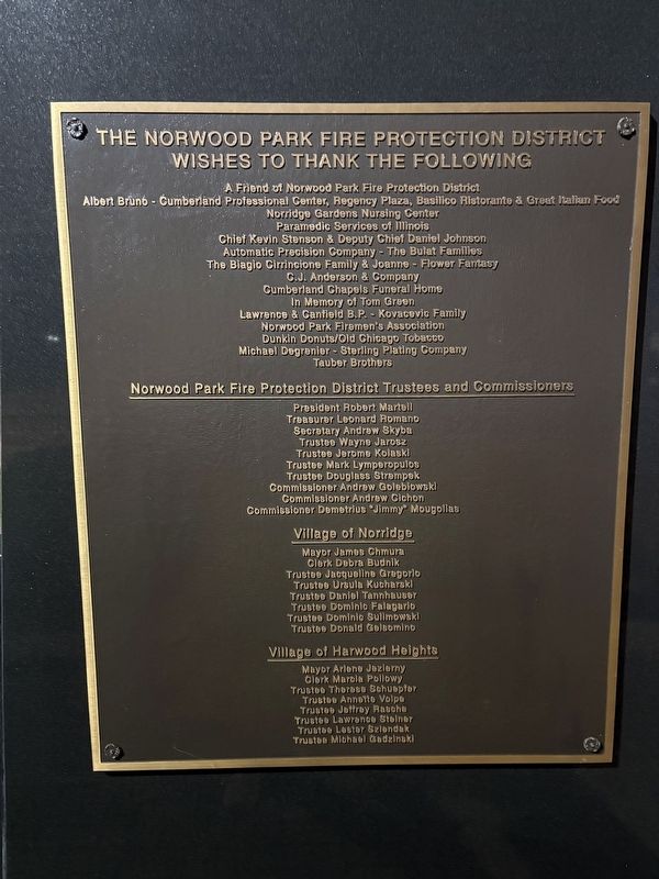 Dedication plaque on rear of memorial image. Click for full size.