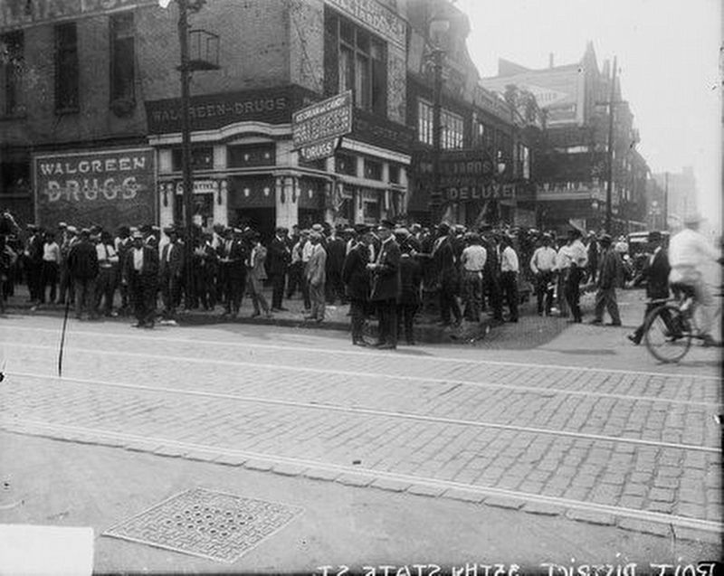 Black men crowd at 35th and State image. Click for full size.