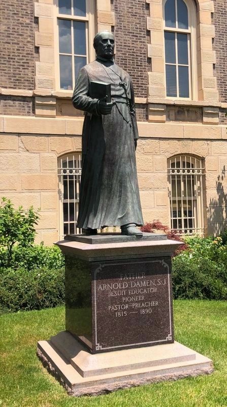 Father Arnold J. Damen statue image. Click for more information.