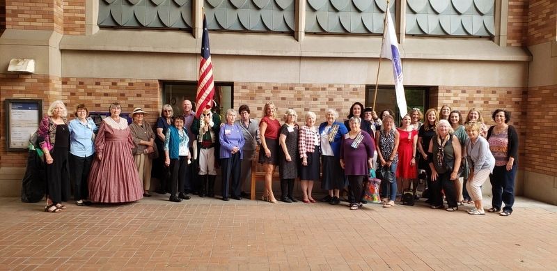 Mercer Girls chapter members celebrating the new bench with historic plaques. image. Click for full size.