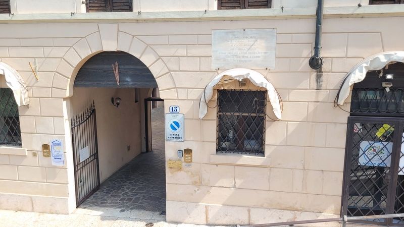 The marker is located at the entrance to the building image. Click for full size.