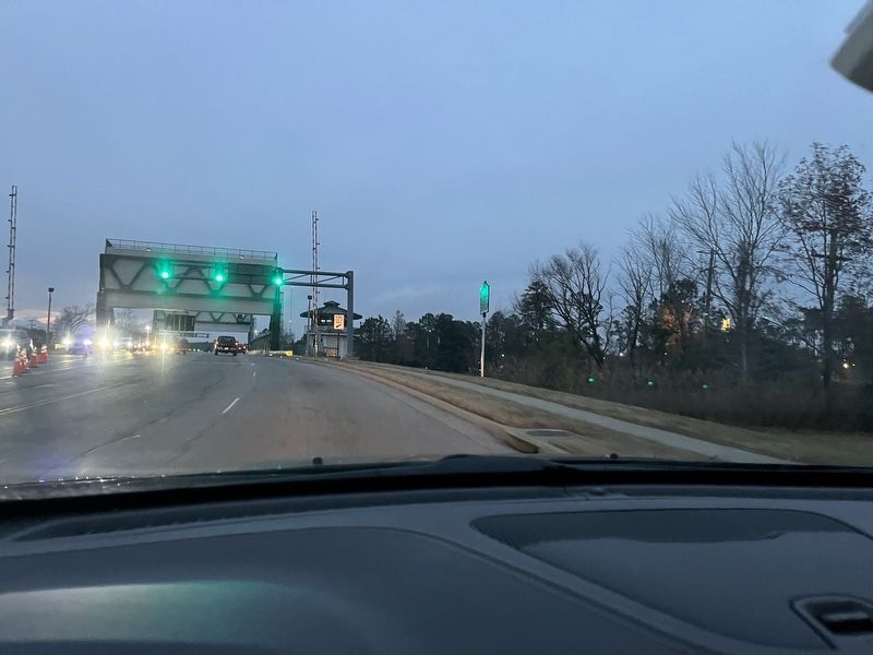 Battle of Great Bridge Marker - green bridge lights are reflected on the marker, parallel w/road image. Click for full size.