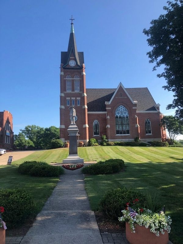 Swiss Pioneers Monument in front of Swiss United Methodist Church. Click for full size. Swiss Pioneers Monument in front of Swiss United Methodist Church image. Click for full size.